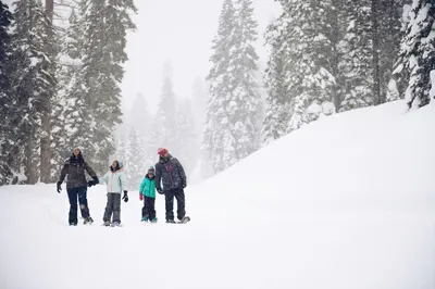 a group of people standing in the snow at Your Roomy Northstar Retreat Awaits in Truckee