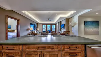 a kitchen with a large island in a room at Luxury 3Br Residence Steps From Heavenly Village & Gondola Condo in South Lake Tahoe