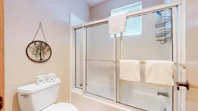 a bathroom with a shower and a toilet at Snowcreek 880 Condo in Mammoth Lakes