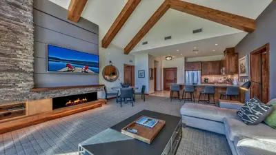 a living room with a couch and a fireplace at Luxury 2Br Residence Steps From Heavenly Village & Gondola Condo in South Lake Tahoe