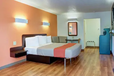 a hotel room with a large bed in a room at Motel 6-Bishop, CA in Bishop