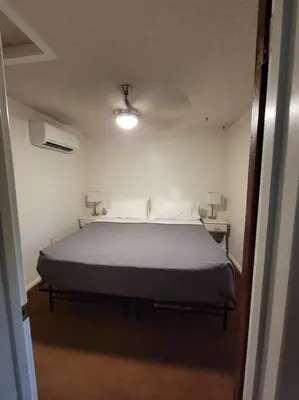 a bedroom with a large bed in a room at Becky's Condo in Mariposa