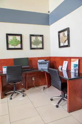 an office with two desks and two chairs at Quality Inn Merced Gateway to Yosemite in Merced