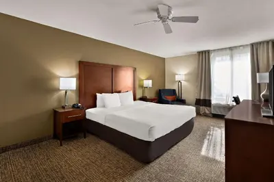 a hotel room with a bed and a television at Comfort Inn & Suites Sequoia Kings Canyon in Three Rivers
