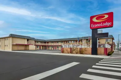 a sign for a hotel on the side of a road at Econo Lodge Fallon Naval Air Station Area in Fallon