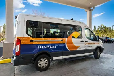 a white van parked at a gas station at Comfort Inn & Suites Airport Convention Center in Reno