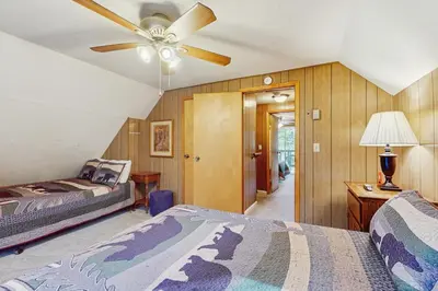 a bedroom with two beds and a ceiling fan at Take me back to Talbot in South Lake Tahoe