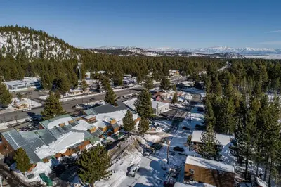 an aerial view of a town with snow covered trees at Cinnamon Bear Inn in Mammoth Lakes