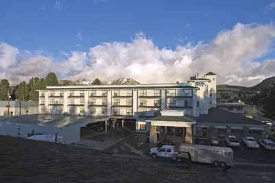 a large white building with a truck in front of it at Shilo Inn Mammoth Lakes in Mammoth Lakes