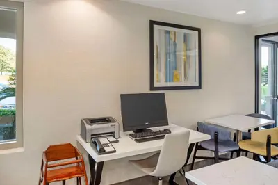 an office with a desk with a computer on it at Best Western Exeter Inn & Suites in Exeter