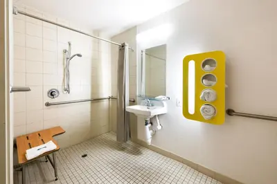 a bathroom with a sink and a shower at Motel 6-Carson City, NV in Carson City