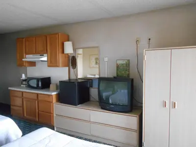 a television sitting on a dresser in a room at Victorian Inn in Reno