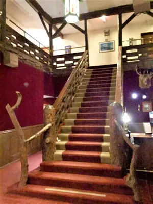 a set of stairs in a building at Heidelberg Inn & Resort in June Lake