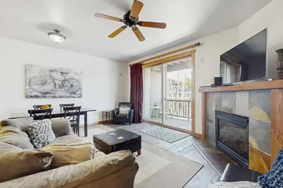 a living room with a couch and a fireplace at Dolomite Delight in Truckee