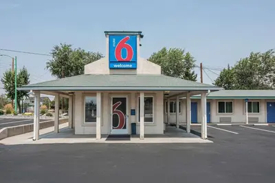 a gas station with a sign on top of it at Motel 6-Fallon, NV in Fallon