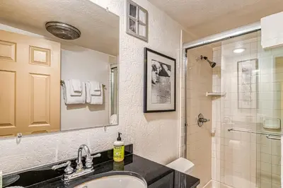 a bathroom with a sink and a shower at Courchevel 57 in Mammoth Lakes