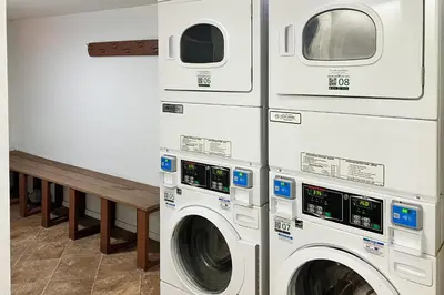 two washing machines sitting next to each other at Courchevel 57 in Mammoth Lakes