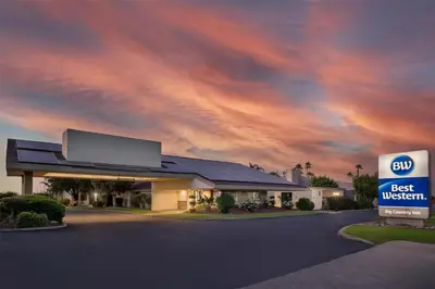 a building with a best western sign in front of it at Best Western Big Country Inn in Coalinga