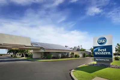 a best western sign in front of a building at Best Western Big Country Inn in Coalinga