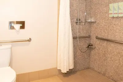 a bathroom with a shower with a toilet at Best Western I-5 Inn & Suites in Lodi