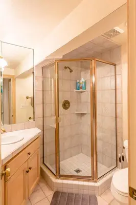 a bathroom with a shower with a sink and a toilet at Beautiful 3500sf Lake Tahoe Home W/ Open Layout in Zephyr Cove