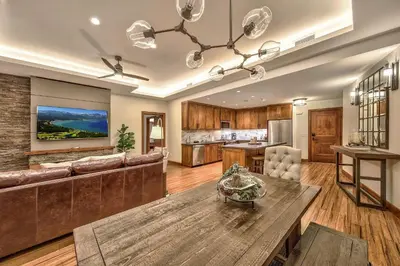 a living room with a couch and a table at Steps From Heavenly Village & Gondola-Luxury 3Br Residence Condo in South Lake Tahoe