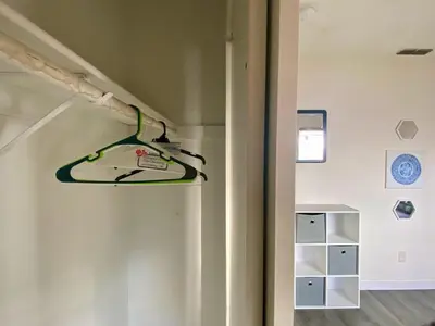 a hanger on the wall in a room at WHOLE Family - Wolfgram in Sacramento