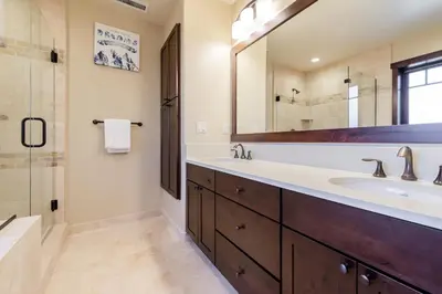 a bathroom with a sink and a mirror at Mountainside 4 in Mammoth Lakes