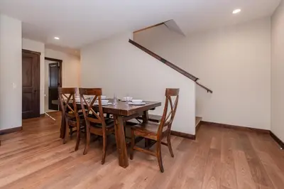 a dining room with a table and chairs at Mountainside 5 in Mammoth Lakes