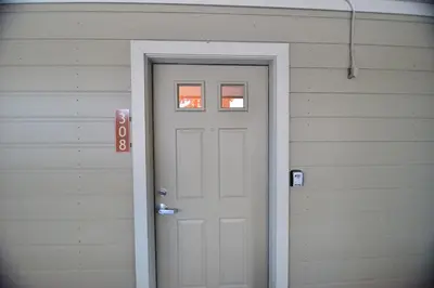 a white door with a window on a house at 1849 #308 in Mammoth Lakes