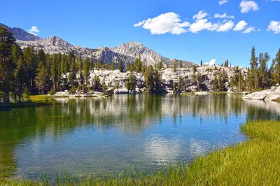 a large lake in the middle of a mountain at 1849 #308 in Mammoth Lakes