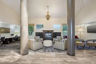 a lobby with couches and a fire place at Best Western Porterville Inn in Porterville