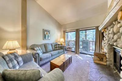 a living room with couches and a fireplace at The Summit 276 in Mammoth Lakes