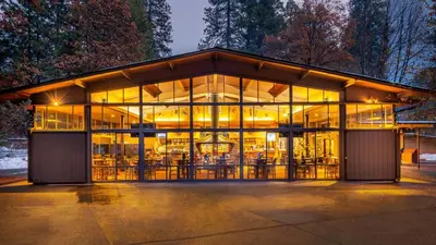 a large glass building with a lot of windows at Yosemite Valley Lodge in Yosemite Village