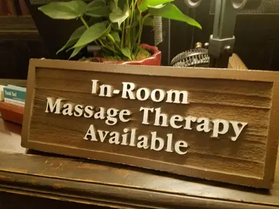 a sign that reads in room massage therapy available at The Ahwahnee in Yosemite Village