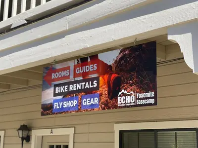 a billboard on the side of a building at Yosemite Basecamp in Groveland