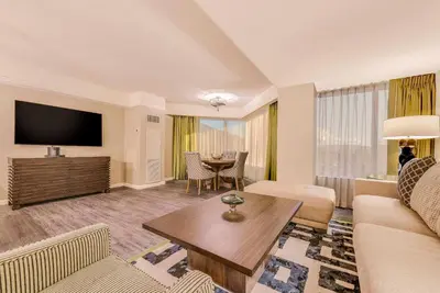 a living room with a couch and a table at Caesars Republic Lake Tahoe, A Caesars Destination in Stateline