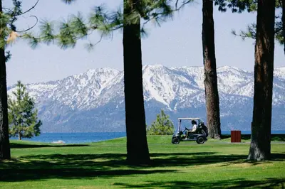 a person on a scooter with mountains in the background at Caesars Republic Lake Tahoe, A Caesars Destination in Stateline
