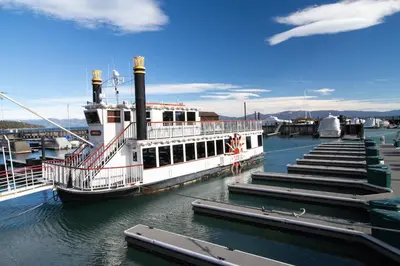 a ferry boat is docked at a dock at Scott Peak Views in Alpine Meadows
