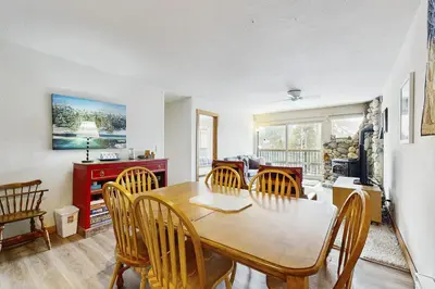 a dining room with a table and chairs at Scott Peak Views in Alpine Meadows