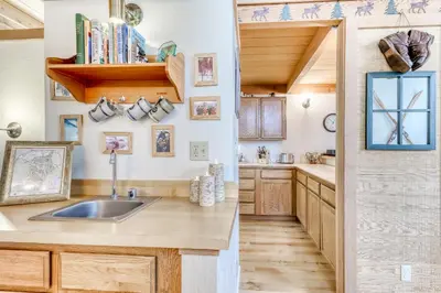 a kitchen with a sink and a counter top at Northstar Condo in the Trees in Truckee