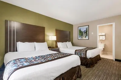a hotel room with two beds in a room at Heritage Inn - Yosemite/Sonora in Sonora