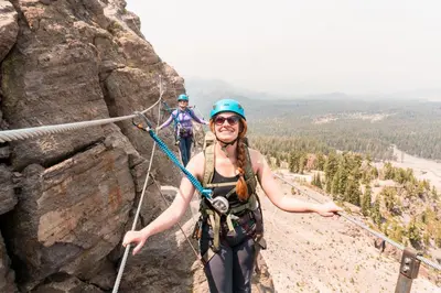 two people climbing on a rock wall at Aspen Creek #311 condo in Mammoth Lakes