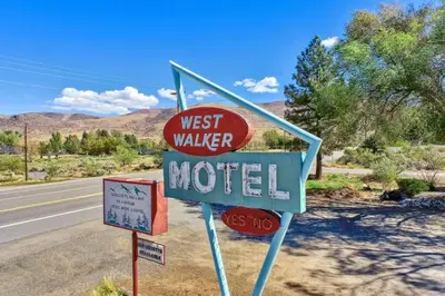 a sign for a motel on the side of the road at The Historic West Walker Motel in Walker