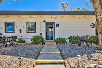 a home with a pathway leading to the front door at The Historic West Walker Motel in Walker