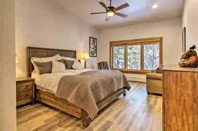 a bedroom with a bed and a ceiling fan at Forest-View Gem 2 Mi to Diamond Peak Ski Resort! in Incline Village