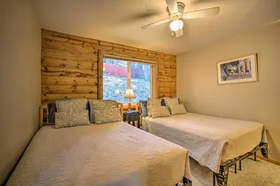 a bedroom with two beds and a window at Hot Tub, Indoor Pool! Home 8 Mi to Heavenly Skiing in South Lake Tahoe
