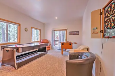 a living room with a pool table and ping pong ball at Family Tahoe Donner Retreat Less Than 2 Mi to Downhill Ski in Truckee