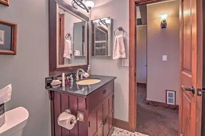 a bathroom with a sink and a mirror at Private Deck and Community Pool Incline Village Gem in Incline Village