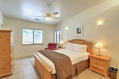 a bedroom with a bed and a ceiling fan at Rustic Truckee Lodge with Rec Room - Near Northstar! in Truckee